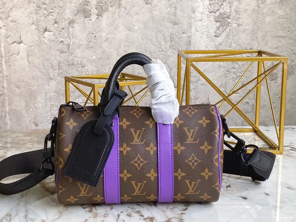 First bag BANDOULIÈRE LOUIS KEEPALL VUITTON 25 0602